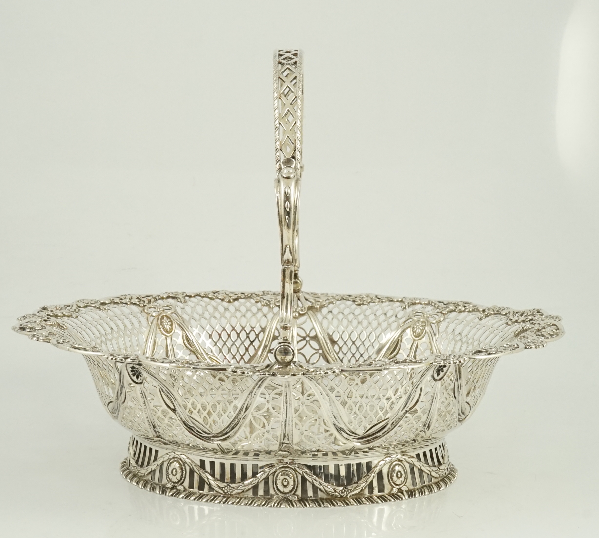 A George III pierced silver oval bread basket, by Charles Aldridge & Henry Green